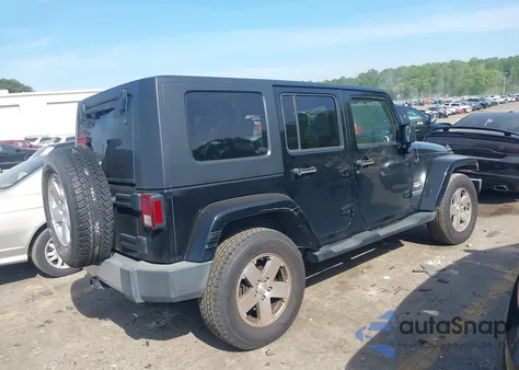 2008 Jeep Wrangler Unlimited Sahara from USA, damaged, VIN 1J4GA59198L531724